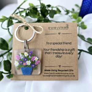 Keyring with a handpainted pot of flowers on it.