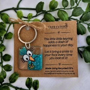 Keyring with a handpainted funny bird on it.